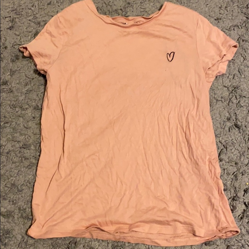 pink t shirt with heart detail